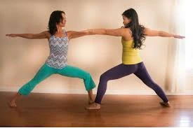 Warrior Pose 2, with a partner on the back