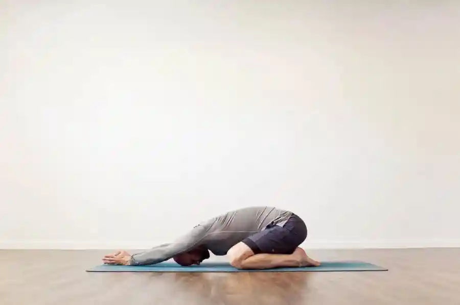 Ardha kurmasana