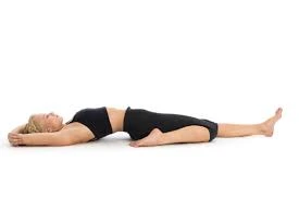 Supta virasana variation one leg straight