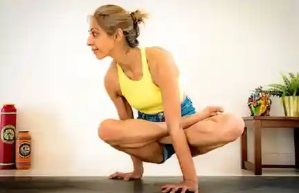 Tolasana Twisting Variation